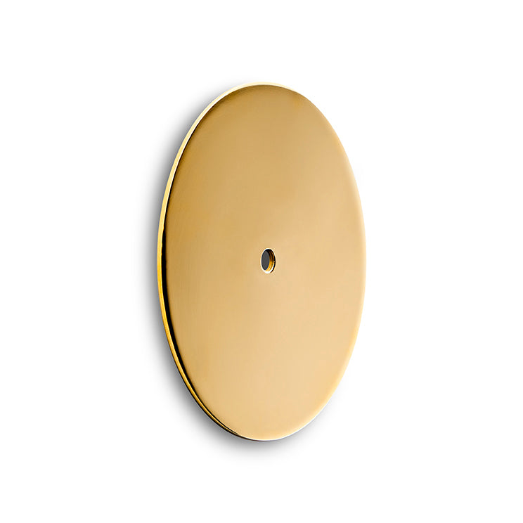 Rund messing bagplade til Get a grib møbelknopperne fra Design by Us.