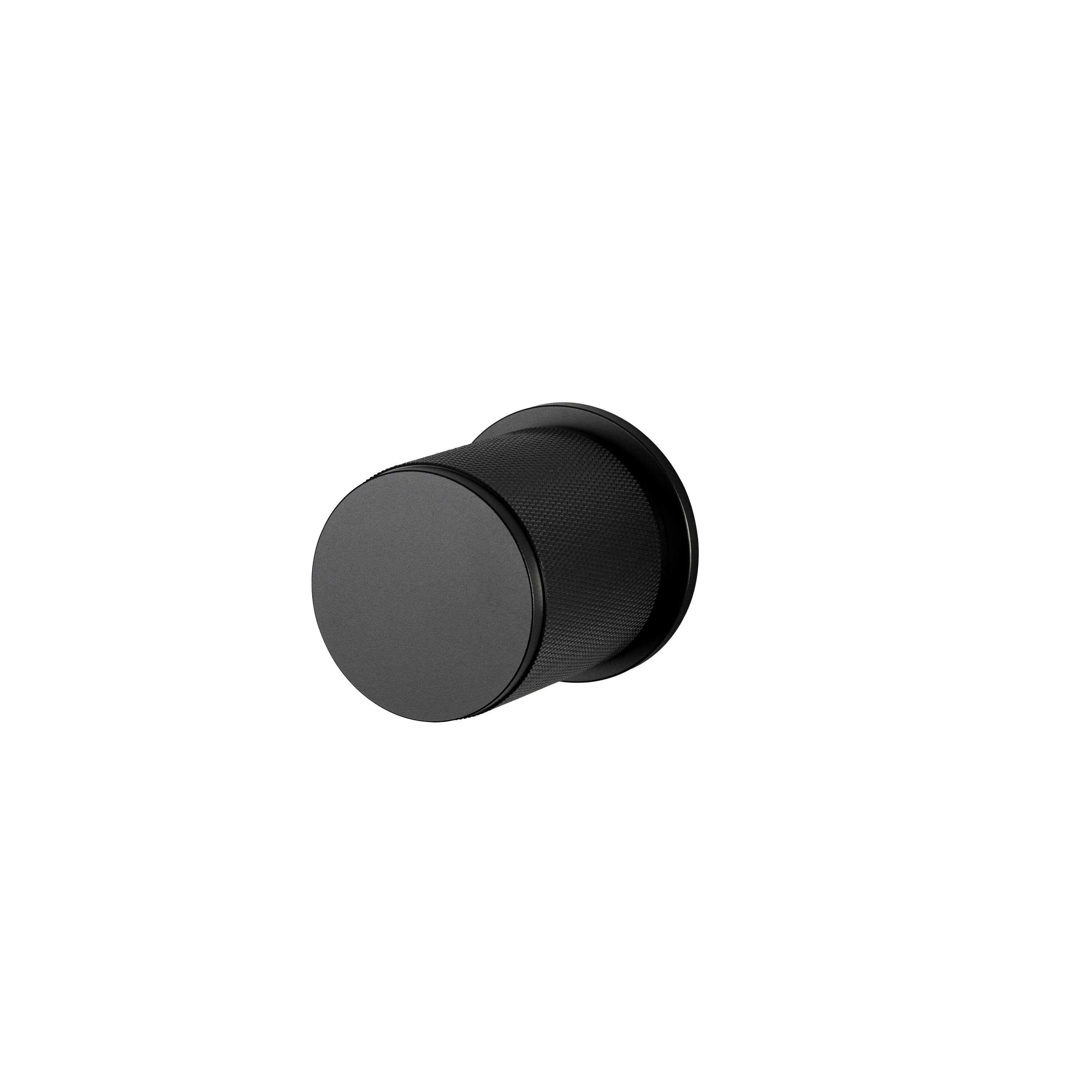 Sort dørknop med det riflede diamond cut mønster.