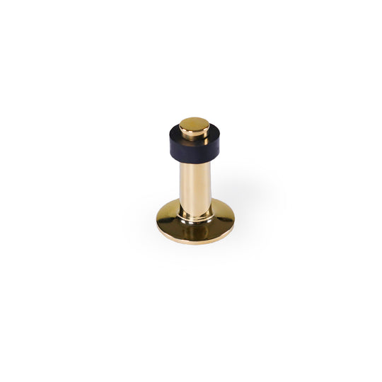 Türstopper aus massivem, poliertem und unlackiertem Messing mit schwarzem Gummiband. Höhe 70 mm.