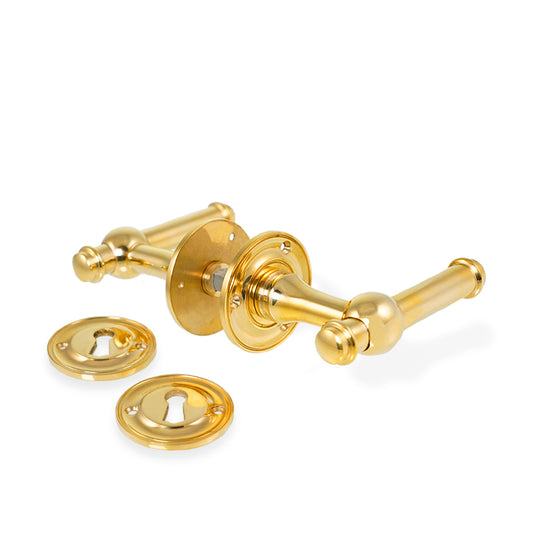 Ordrup dørhåndtag i blank messing inkl. roset og nøgleskilt (stor model)