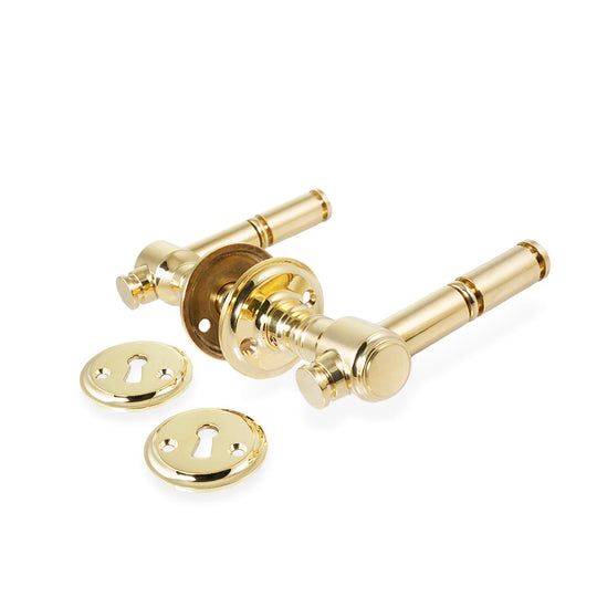 Skovshoved dørhåndtag i blank messing uden lak inkl. roset og nøgleskilt